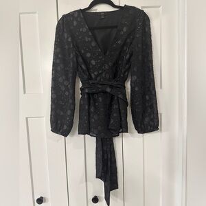 J Crew blouse with black metallic details.